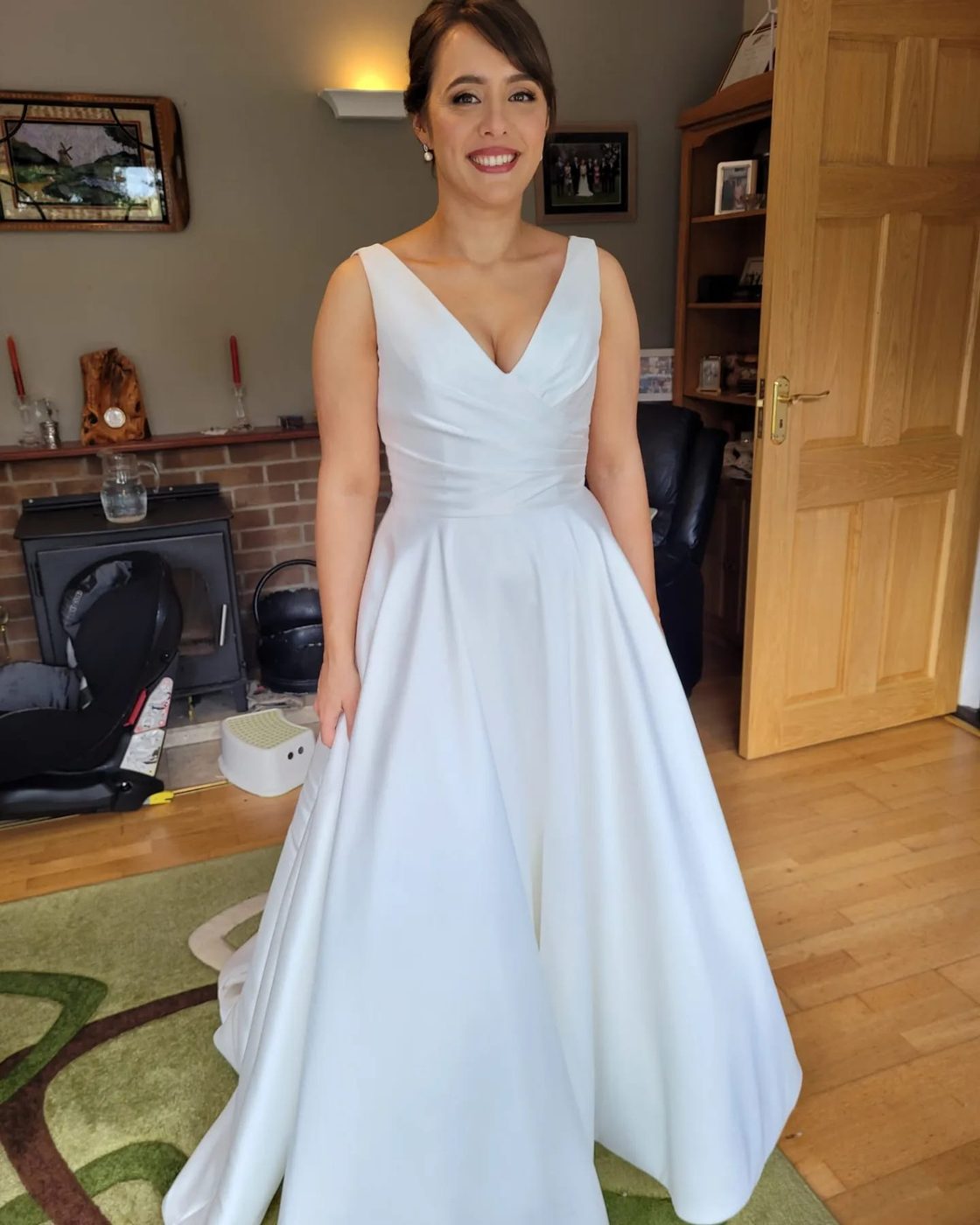 Bride in her gown with a soft brunette blow-dry, styled at INCH Hair Design