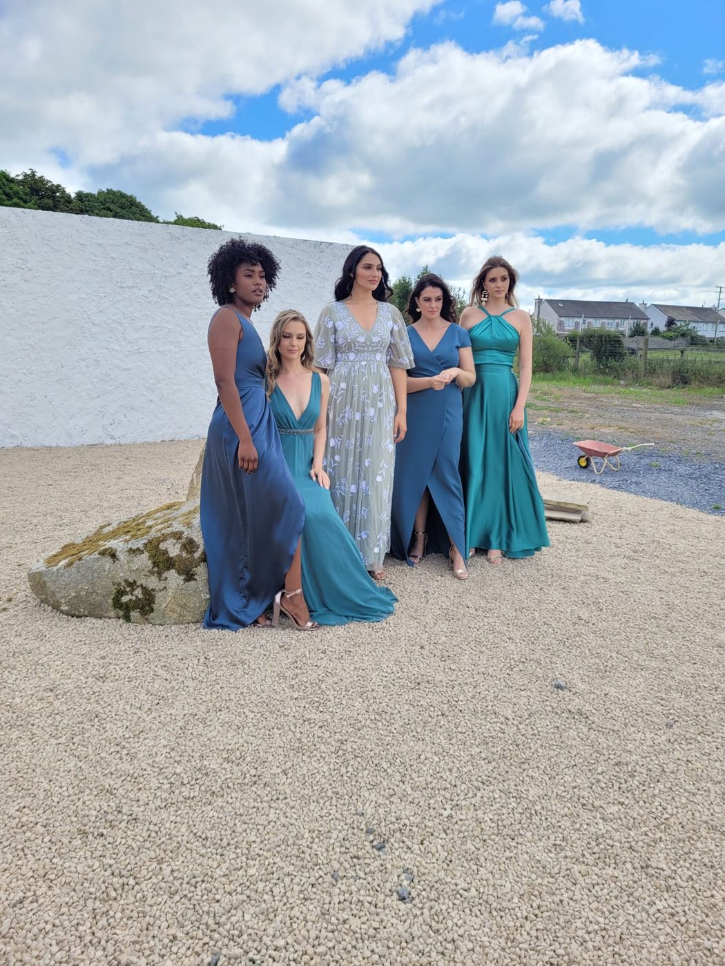 A bridal party in blue tones with occasion hair by INCH Hair Design