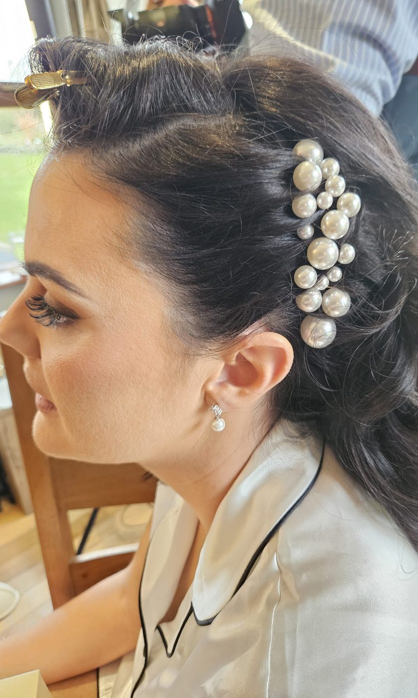 Bridal waves dressed with pearl hair clips at INCH Hair Design