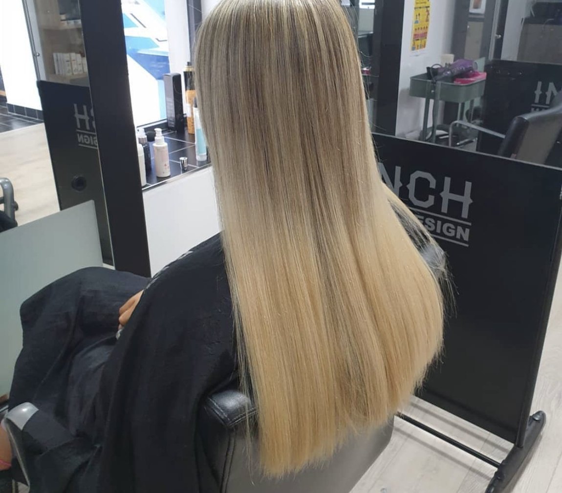 Sleek, glossy blonde colour and blow-dry by Joan at INCH Hair Design