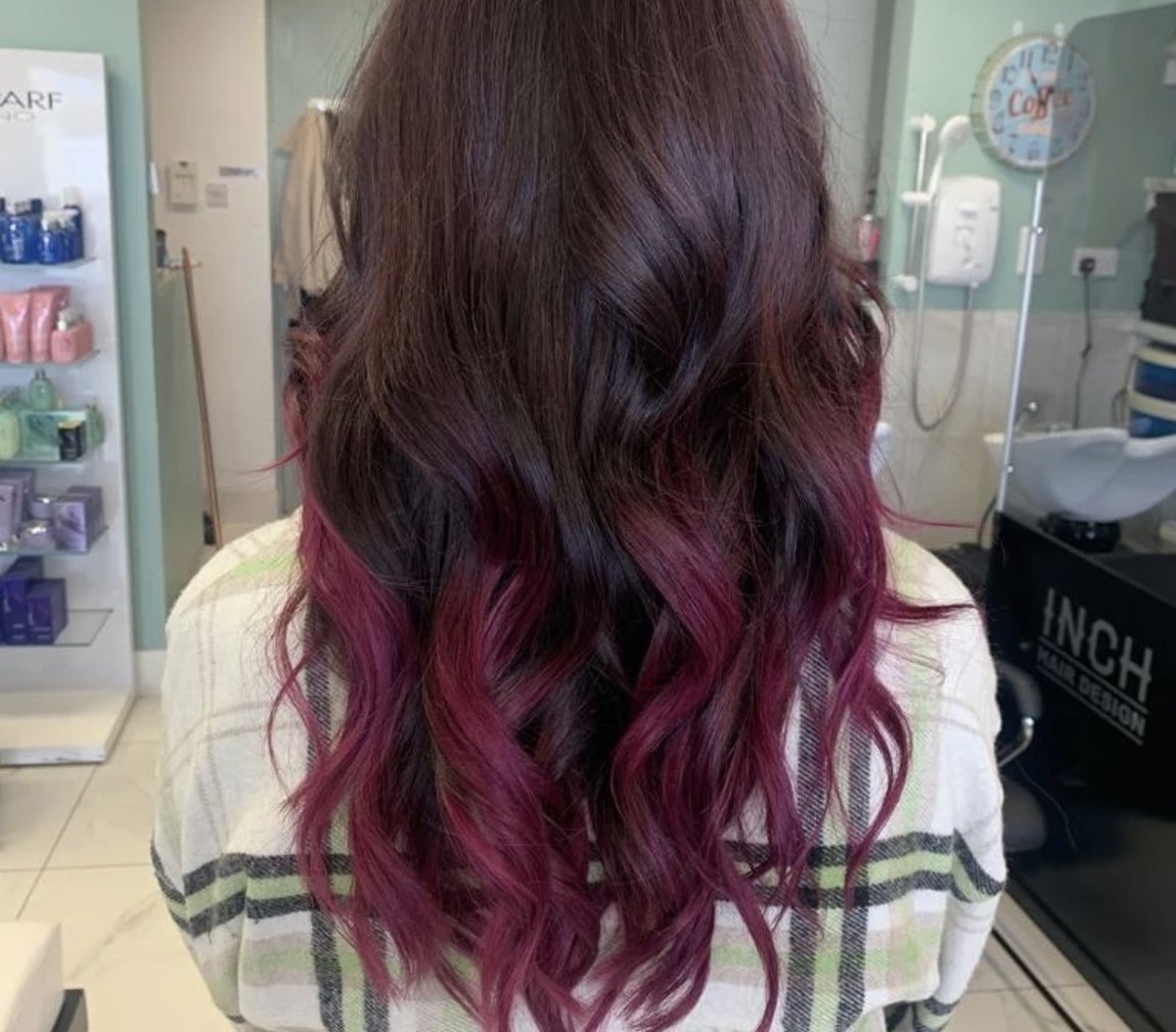 Soft blonde balayage with loose waves by Orla at INCH Hair Design